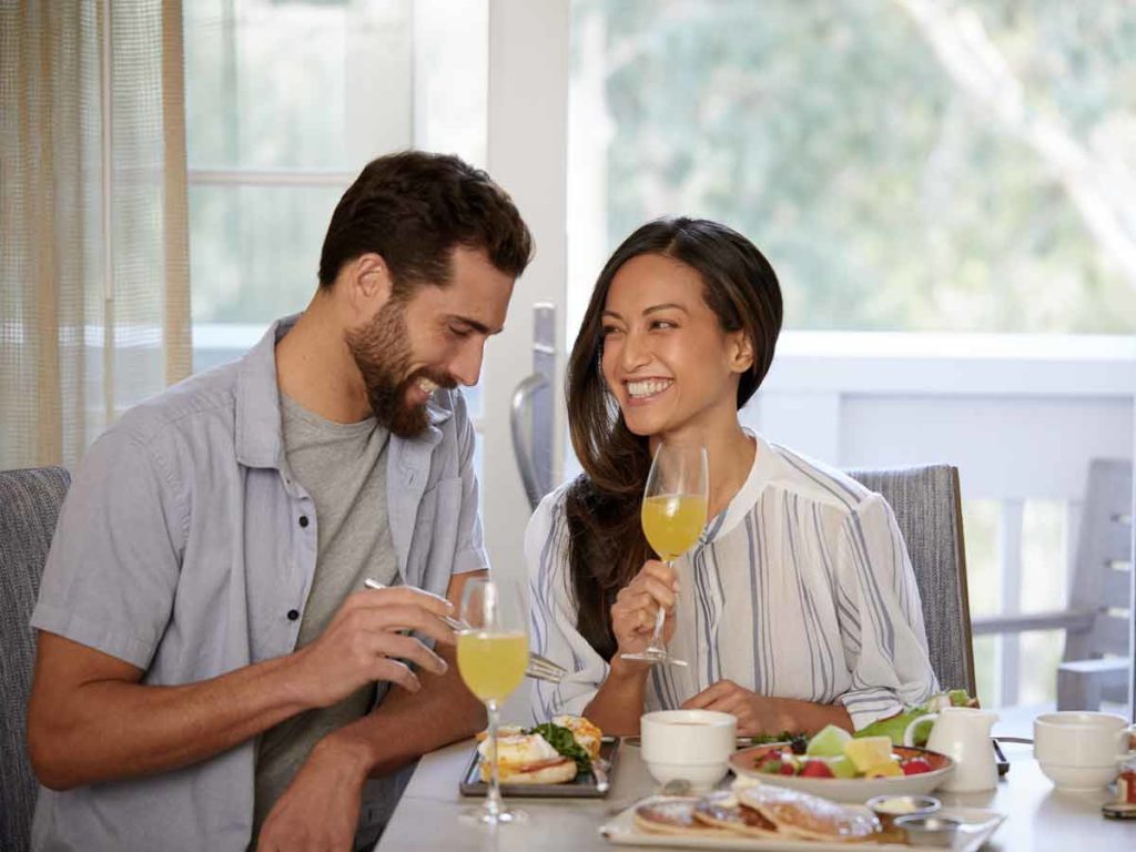Couple eating breakfast at Alba.