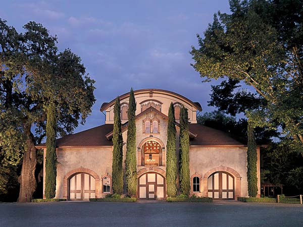 The carriage house exterior in the evening.