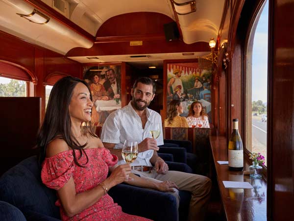 Couple Having Wine On The Wine Train.