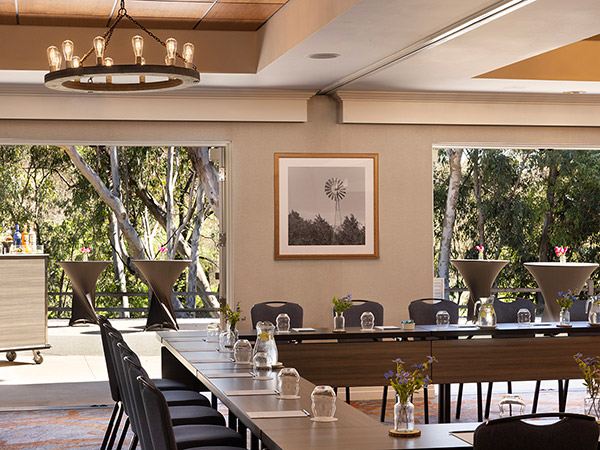 Large Meeting Space With Open Doors To A Patio